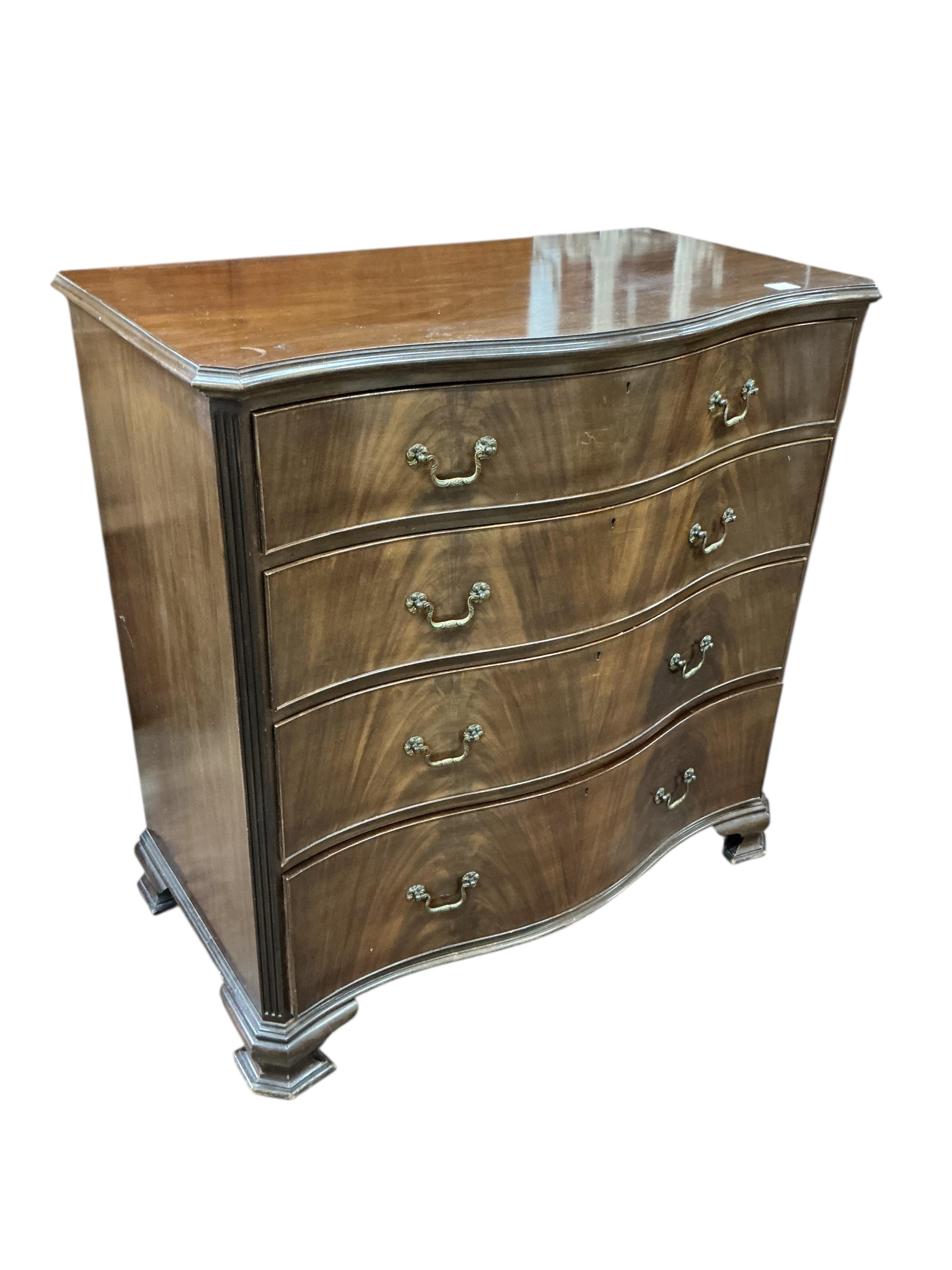 A George III style mahogany serpentine chest of drawers, width 106cm, depth 57cm, height 108cm